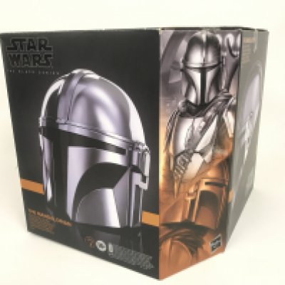 A Boxed The Black Series Star Wars The Mandalorian Helmet.