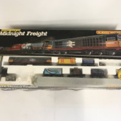 3 boxed Hornby Railways sets. Sets include Midnight Freight. Eight Freight and GWR Mixed Traffic. All are playworn and have parts missing. No reserve.