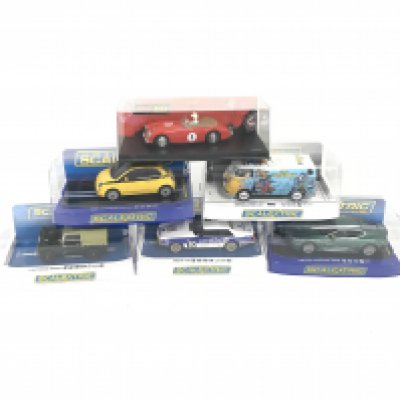6 boxed Scalextric cars. To include Aston Martin DBS. Jaguar XJS. Land Rover Series 1. Fiat Cinquecento. VW panel Van T1B. Austin Healey 3000. No reserve.