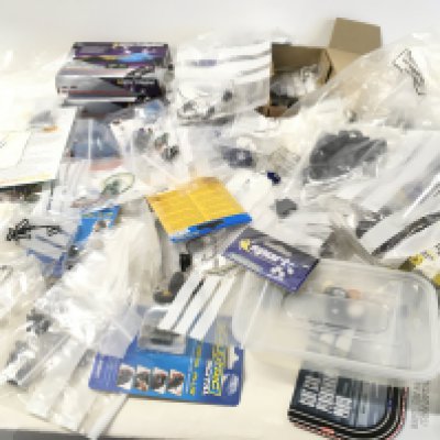A large collection of spare parts and accessories for Scalextric cars. No reserve