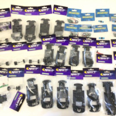 A Box Containing A Collection of New Scalextric Spares.