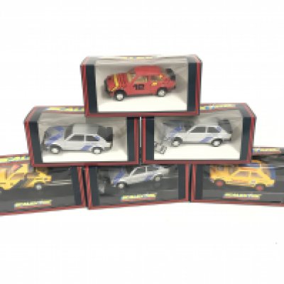 6 boxed Scalextric cars. All Ford escorts with some various decals. No reserve.