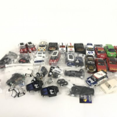 A box containing approximately 20 Scalextric cars. Plus various spares and accessories. No reserve.