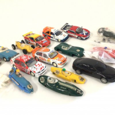 A Box Containing Scalextric parts and Spares.