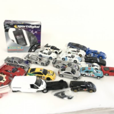 A box containing a quantity of Scalextric cars. Also to include some spares and accessories. No reserve.