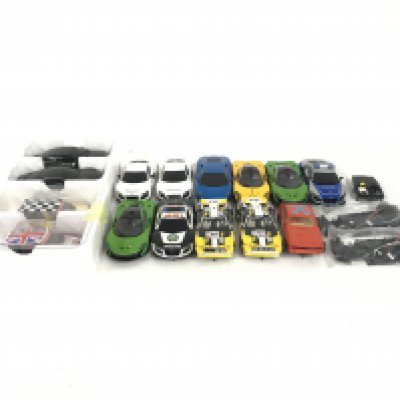 A collection of 15 Scalextric cars. Plus some spare parts. No reserve.