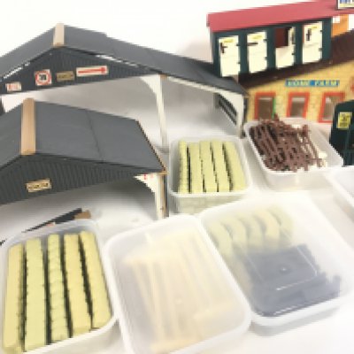A Box Containing a Large Collection of Britains Farm Buildings. Vehicles. And accessories. No Reserve. (2).