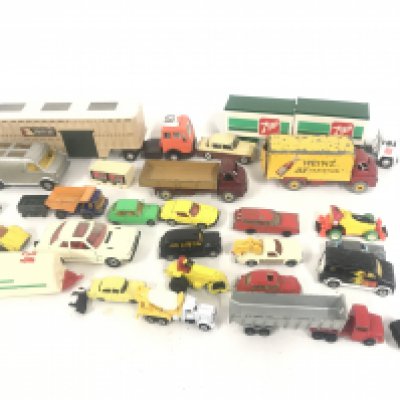 A Box Containing Playworn Plastic and Diecast Vehicles including Matchbox. Dinky. And Others. No Resrve.