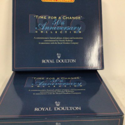 A pair of Royal Doulton commemorative plates made for Hornby railway. Each also contains a model train. (2)