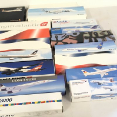 A collection in excess of 15 boxed model aircraft which were sold by the respective airlines to passengers.