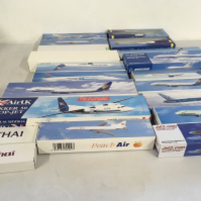 A collection of model civil aircraft depicting airlines from across the world all in original boxes and require assembly.