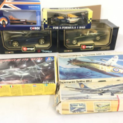 A collection of model cars by burago..Corgi and Onyx all in original packaging. Also 3 model kits by Airfix..Revell and Italeri all unstarted.