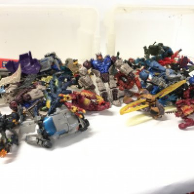 Two boxes containing a collection of Transformers Beast Wars figures. (2)
