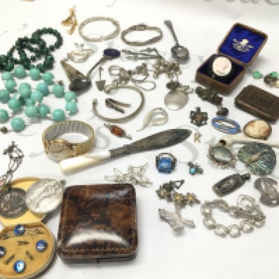 A collection of costume Jewellery including silver pieces such as bracelets, rings , brooches etc , coral jet brooch, 9ct gold K initial pendant, Portuguese medal . Postage category B