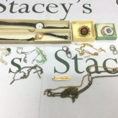 A collection of costume jewellery to include a high carat gold Egyptian cartouche pendant, various chains, two watches etc. Shipping category B.