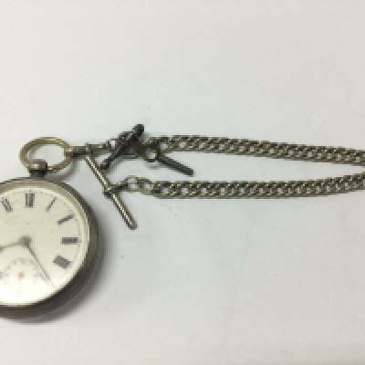 A silver cased pocket watch with silver chain. Not seen running. 154g approx