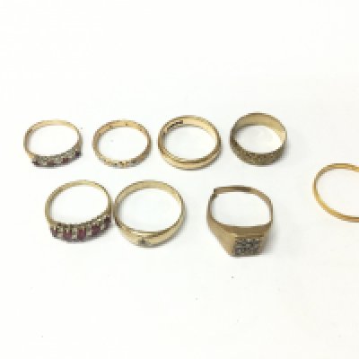 A collection of 7 9ct gold rings 16.22g of various designs and 1 22ct gold 1.59g