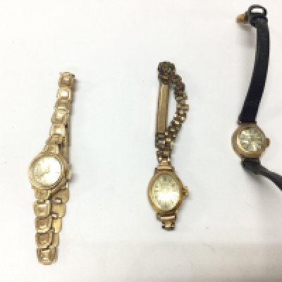 A 9ct gold watch 12.66g a rolled gold watch 12.29g and a 9ct gold cased watch 7.59g Postage B