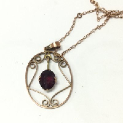 A gold pendant on chain. 2.26g Postage A