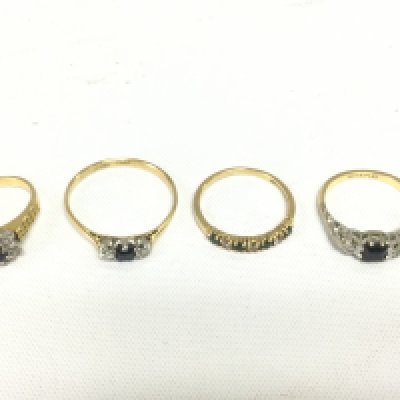 Four 18ct gold rings set with sapphires and diamonds, approx total weight 10.3g and approx sizes K, U, F and M. Shipping category A.