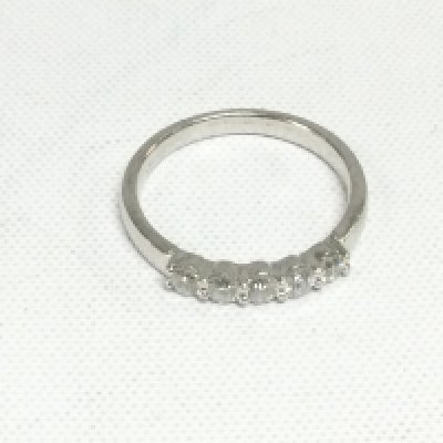 An 18ct white gold five stone diamond ring, approx 2.3g and approx size H. Shipping category A.