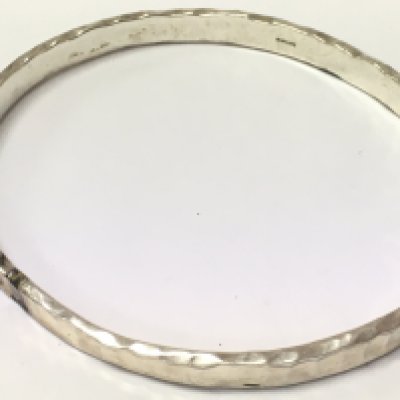 A silver bangle , 22.5g total weight. Postage category A- NO RESERVE