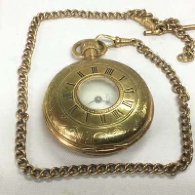 WITHDRAWN - A yellow metal half hunter fob watch and chain. Shipping category A.- NO RESERVE
