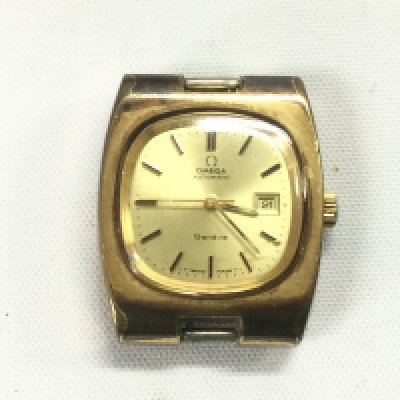 An Omega watch, no strap. Box and paperwork included. Shipping category B.