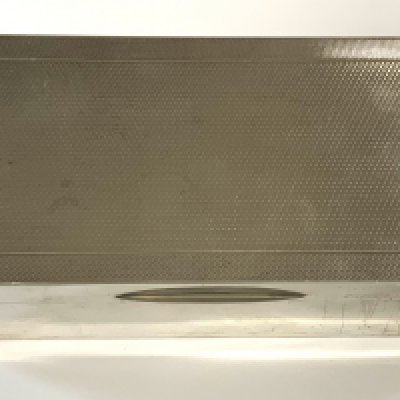 A hallmarked silver cigarette box with engine turned decoration to cover, marks for Mappin & Webb, London 1931.