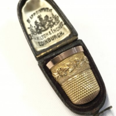 A 9 carat gold thimble . 5g total weight. Postage category a