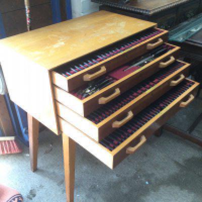 A freestanding Grenadilla canteen of cutlery. Shipping category D.