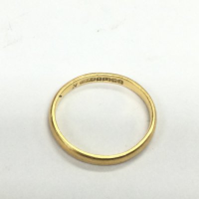 A 22ct gold wedding band, approx 2.2g and approx size K. Shipping category A.