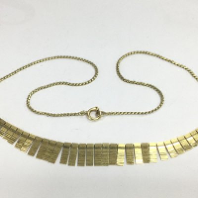 A 14ct gold modern design necklace, approx 11.7g. Shipping category A.