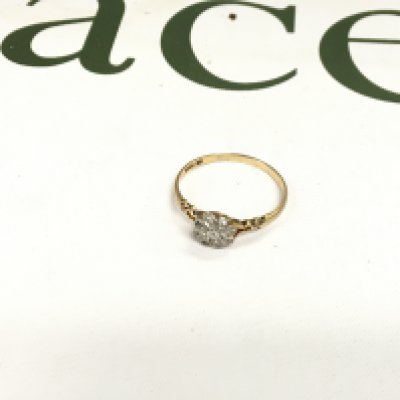 An 18ct gold diamond cluster ring. Approx weight 3.08 grams, size Y.