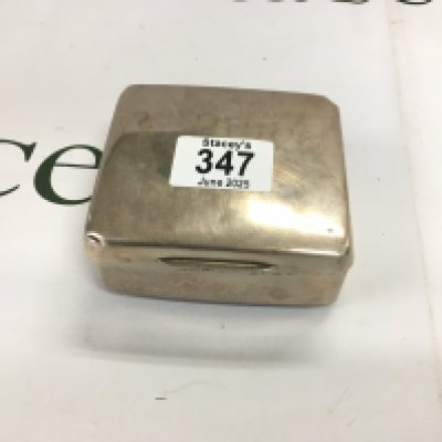 A silver box with leather bottom and wooden inside.