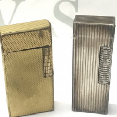 Two Dunhill lighters, 23cm tall. Postage category A