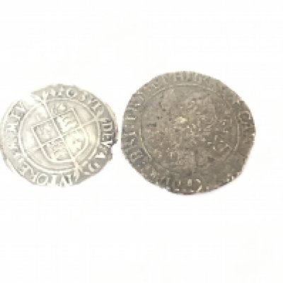 A Charles I silver shilling and a 1564 Elizabeth I silver three pence hammered coin (2)