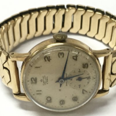 Vintage Smiths watch with a 9ct gold plated strap , postage category A