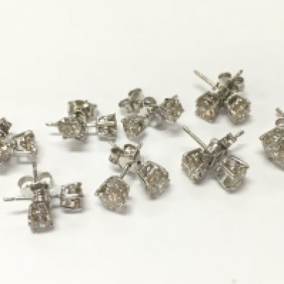 18ct white gold diamond stud earrings. Total weight 12.2g Postage category A