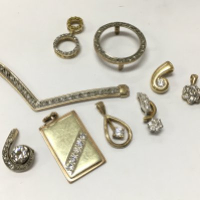 9ct gold diamond set pendants , 15.2g total weight. Postage category A