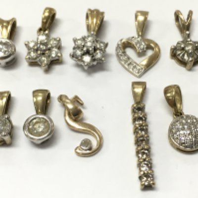 9ct gold diamond pendants , 4.7g total weight, postage category A
