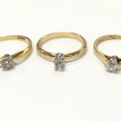 18ct gold diamond solitaire rings size M , N, O. 7.9g total weight. Postage category A