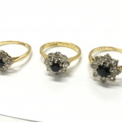 18ct gold sapphire and diamond set cluster ring , 10.7g total weight . Postage category A