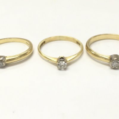 18ct gold diamond solitaire rings , sizes P, L, K. 7g total weight. postage category A