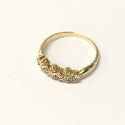 An unmarked high carat diamond fancy style ring, Approx weight 2.10 grams. Size J 1/2.