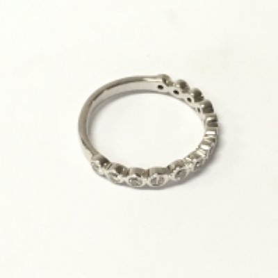 A 9ct white gold half eternity ring, Approx weight 2.17 grams. Size M.