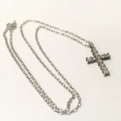 A 9ct white gold cross and 18inch white gold chain, Approx weight 5.6 grams.