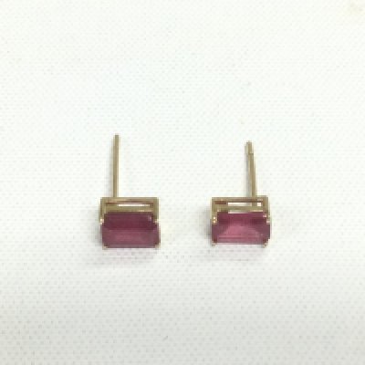 A pair of 9ct gold earrings set with rubies, approx 0.7g. Shipping category D.