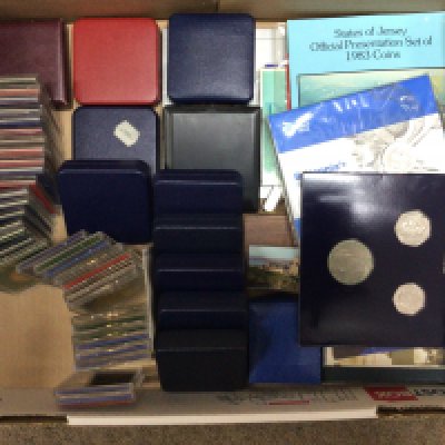 Two boxes of mixed coins including some silver and lots of USA. NO RESERVE