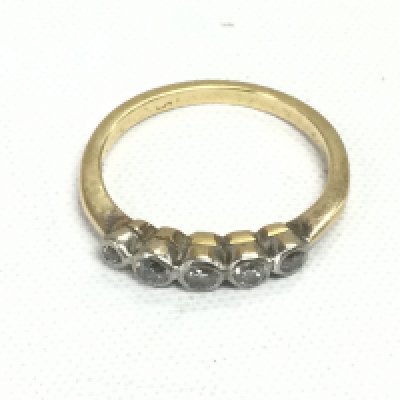 A gold five stone diamond ring, approx 2.5g and approx size K. Shipping category A.